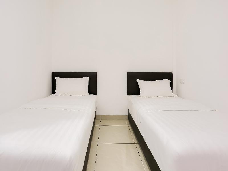 Super Oyo 89495 Rich Hotel Air Hitam Bagian luar foto
